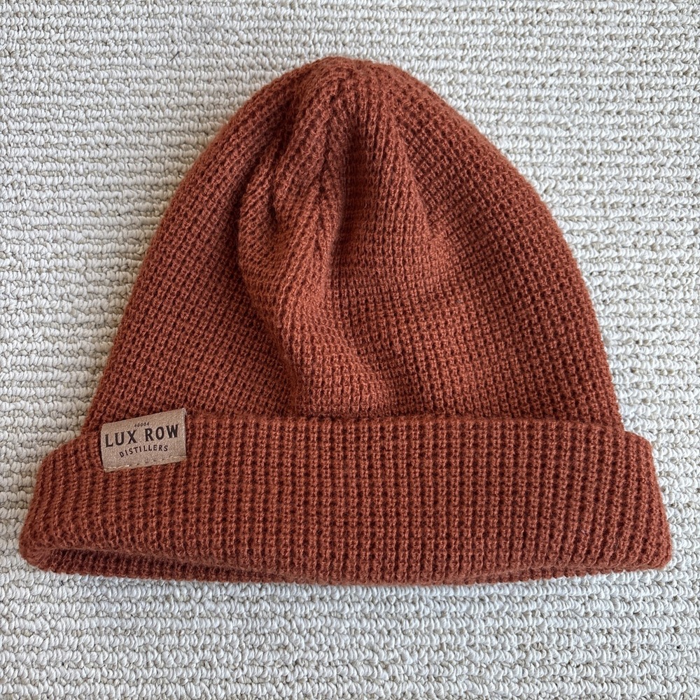 Lux Row Distillers orange Acrylic Beanie Hat Cap Knit